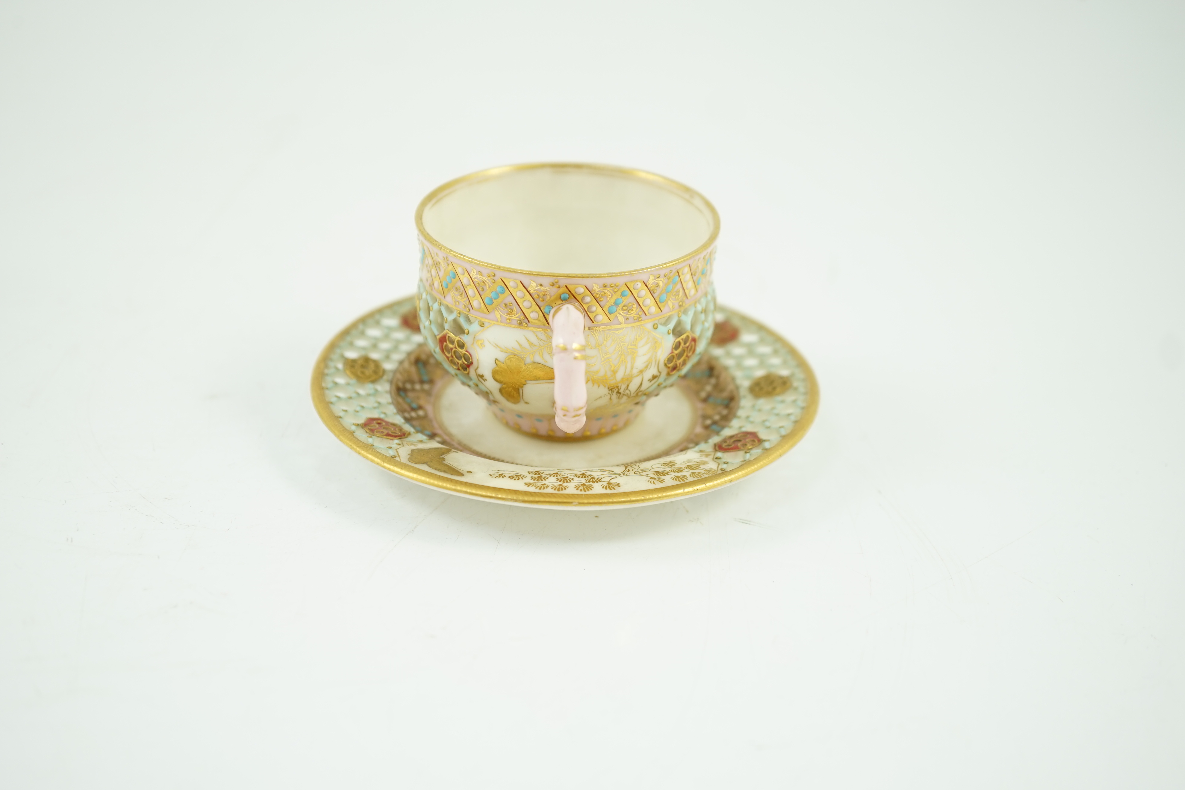 A Royal Worcester reticulated miniature cabinet cup and saucer, late 19th century